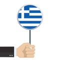 Greece circular flag. Hand holding round Greek flag. National symbol. Vector illustration.